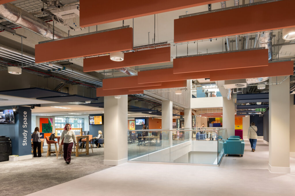 Internal shot of City Campus, showing the collaborative coworking spaces in the atrium.