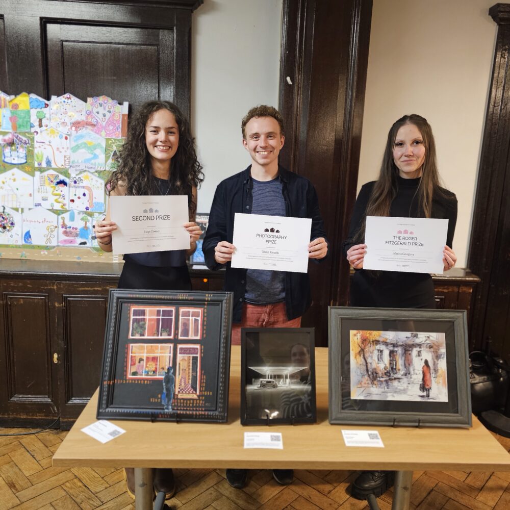 3 Art Challenge winners with their certificates and artwork